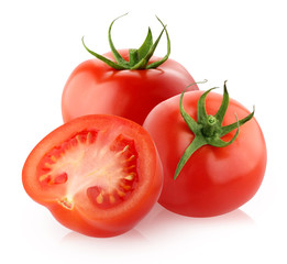 two whole red tomatoes and a half on a white background
