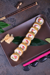 sushi with chopsticks