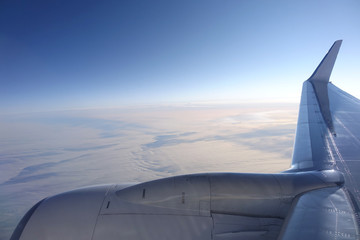 flight above the clouds, aerial view from plane