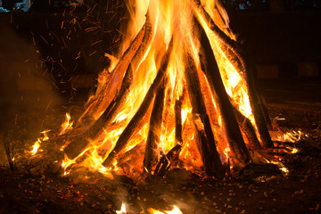 Giant bon fire lit for the festival of Lohri