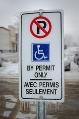 Restricted Handicapped Parking Sign in winter