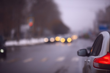 autumn traffic in the city, cars, view from the cab to the track gloomy autumn day