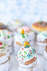 Easter cakes on a white wooden background