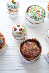 Easter cakes on a white wooden background