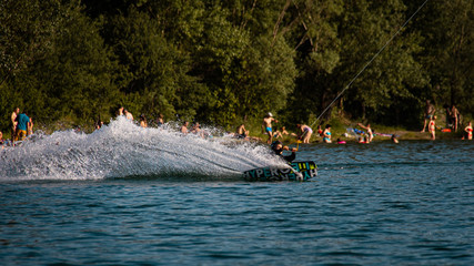 Professional wakeboarder making preparing for a stunt