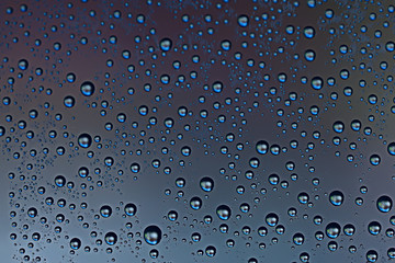 gray wet background / raindrops to overlay on the window, weather, background drops of water rain on the glass transparent