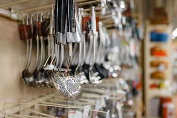 Tableware on the shelf closeup, houseware store