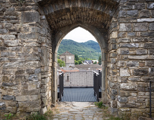 the castle entry gate with a view over Berceto town, Province of Parma, Emilia-Romagna, Italy