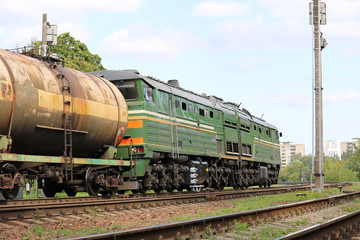 Fototapeta na wymiar diesel locomotive with freight train 