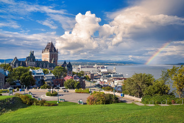 Cityscape of Quebec and St. Lawrence River, On a cloudy sunny day, with rainbow in the background....