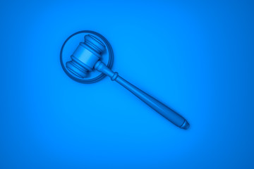 Close-up of the judge's hammer, abstract blue background.3D rendering.