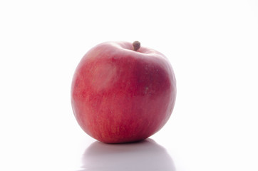 Fresh red apple isolated on white. With clipping path.