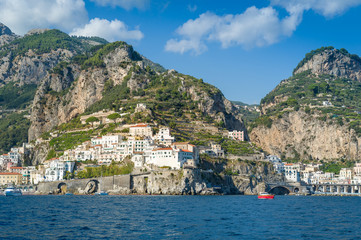 Fototapeta na wymiar Port of Amalfi view from the water. Amalfi coast cruise, Italy.