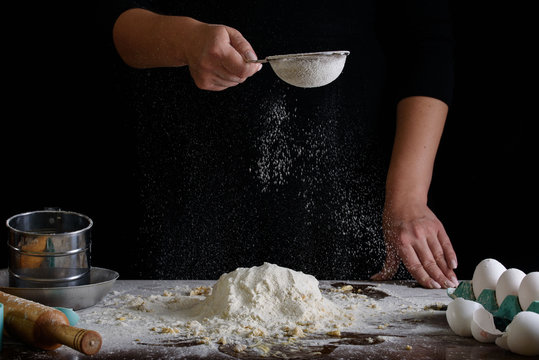 The process of making desserts. Cream cakes, muffins, cookies, groceries. The kitchen and confectioner makes desserts.