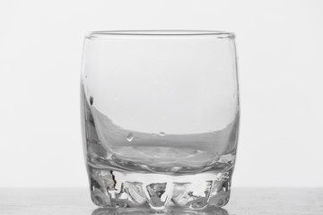 Clean glass for drinks on white background