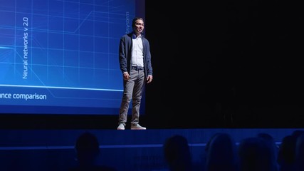 Business Conference Stage: Indian Tech Startup CEO Presents Firm's Newest Product, He's Holding Laptop and Does Motivational Talk about Science, Technology, Software Development and Leadership