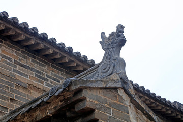 Fototapeta na wymiar Roof tiles of Chinese ancient buildings