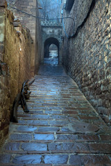 A narrow, damp alley, China
