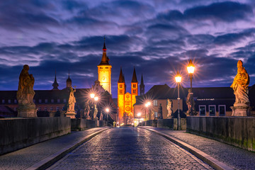 Old Main Bridge, Alte Mainbrucke with statues of saints, Cathedral and City Hall in Old Town of Wurzburg, Franconia, Bavaria, Germany