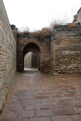 Naklejka premium Narrow stone alley