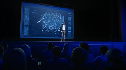 Computer Science Startup Conference: On Stage Speaker Presents New Product, Talks about Neural Networks, Shows Artificial Intelligence App on Big Screen. Video with Vertical Screen Orientation 9:16
