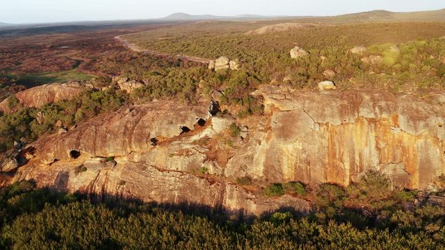 Cape Le Grand National Park in Western Australia - Aerial shot of granite bluff near the bush fire effected area of the national park near Cape Le Grand beach camp site after bush fire