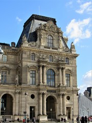 Obraz premium View of the Louvre Palace from within the main courtyard in Paris, France 