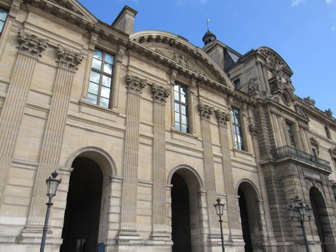 View of the Louvre Palace from within the main courtyard in Paris, France 