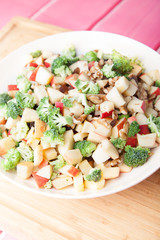 Salad, healthy apple and broccoli 
