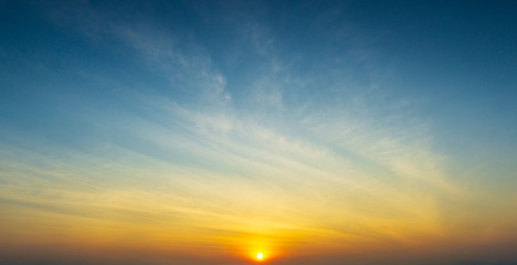 the sun and sky with clouds golden hour time nature background