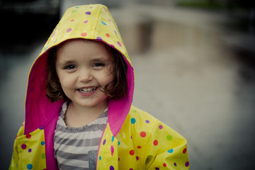 girl in a polka dot coat