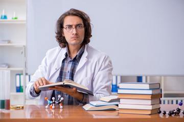 Chemistry lecturer during lecture in college