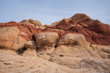 Fototapeta na wymiar Landscape of tall white and red rock formations at Red Rock Canyon Conservation Area in Las Vegas, Nevada