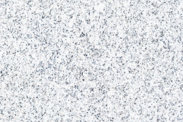 Real granite stone texture in top view. Natural material with gray abstract texture pattern of mineral, quartz. Smooth surface for decorative wall, floor, countertop, slab in bathroom and kitchen.