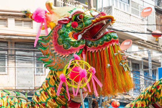 The ball and Chinese golden dragon dance for Chinese new year celebrations. 
