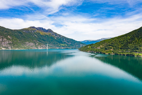 The Hardanger Bridge is a suspension bridge across the Eidfjorden branch of Hardangerfjorden in Hordaland county,Norway.