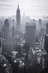 View of Manhattan New York city from a height. Layered silhouettes of skyscrapers, the river...