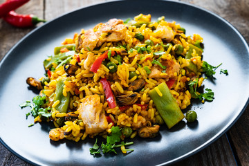 Paella seafood on wooden background