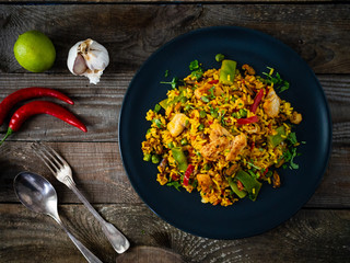 Paella seafood on wooden background