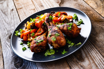 Barbecue chicken drumsticks with roast vegetables