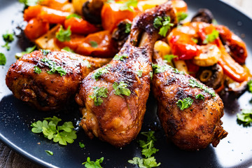 Barbecue chicken drumsticks with roast vegetables