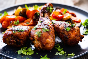 Barbecue chicken drumsticks with roast vegetables