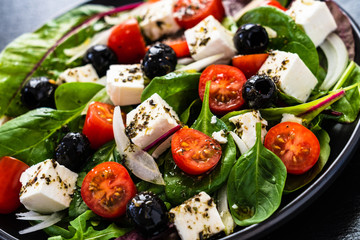 Fresh greek salad - feta cheese, tomato, lettuce, black olives and onion