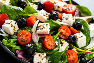 Fresh greek salad - feta cheese, tomato, lettuce, black olives and onion