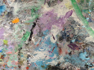 background macro image of a multi-colored surface with splashes and strokes of paint