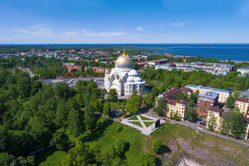 Old St. Nicholas Naval Cathedral in the city panorama on a sunny June day (aerial photography). Kronstadt, Russia