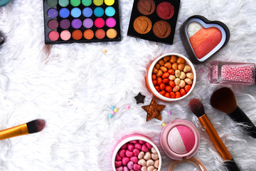 Make up base,Fairy candy pearls blusher,Blush on, Make up brush,Star eye shadows,Foundation,Nail Polish,,Highlights and shading  are on the white wool.