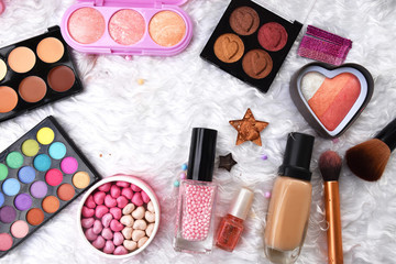 Make up base,Fairy candy pearls blusher,Blush on, Make up brush,Star eye shadows,Foundation,Nail Polish,,Highlights and shading  are on the white wool.