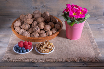 walnuts with berries and flowers