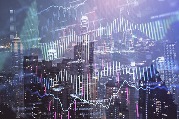 Double exposure of forex chart drawings over cityscape background. Concept of success.